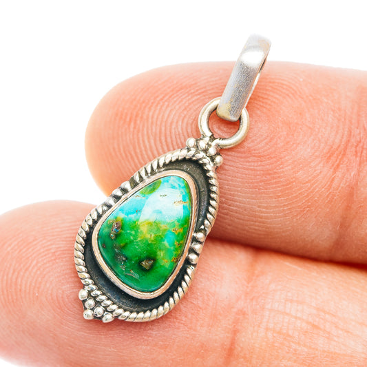 Turquoise pendant in sterling silver with oval green stone cabochon