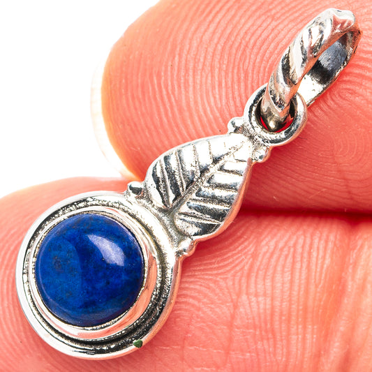 Sterling silver lapis lazuli pendant with round blue cabochon and leaf detail bail