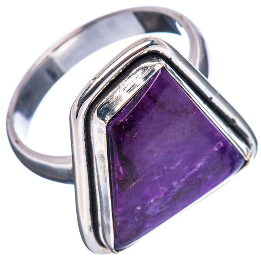Sterling silver ring showing purple sugilite triangle stone and polished metal band