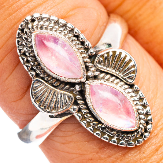 Silver ring with pink oval moonstone and scalloped bezel, size 8.5