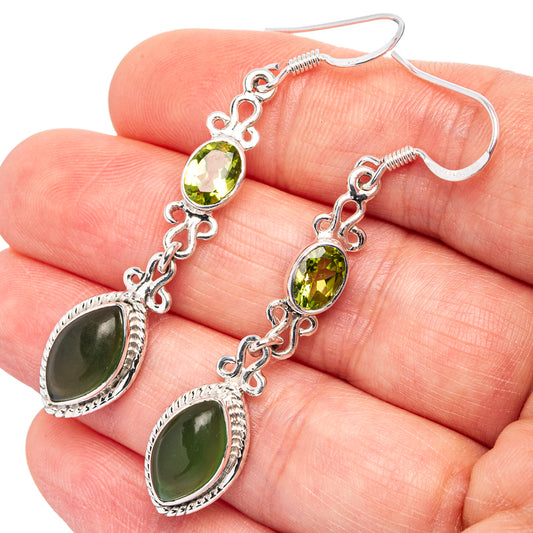 Sterling silver drop earrings with green oval gemstones and linked chain dangles