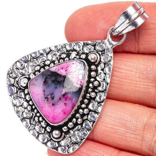 Pink dendritic opal pendant in ornate German silver triangle setting, with bail loop