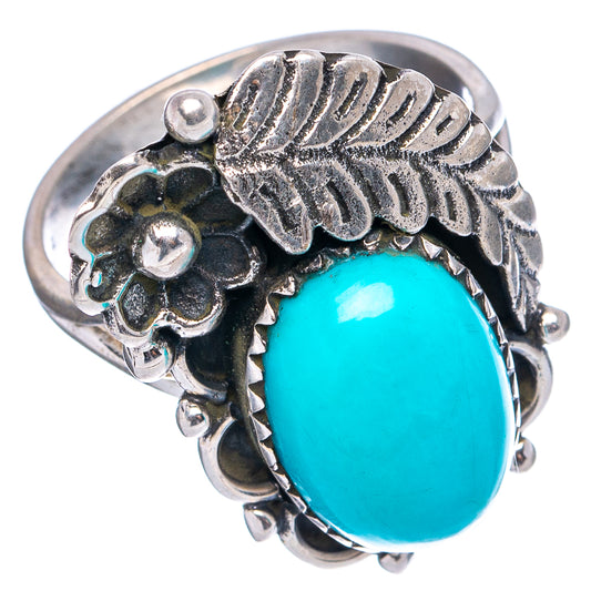 Sterling silver turquoise oval ring with engraved leaf design and ornate scalloped bezel
