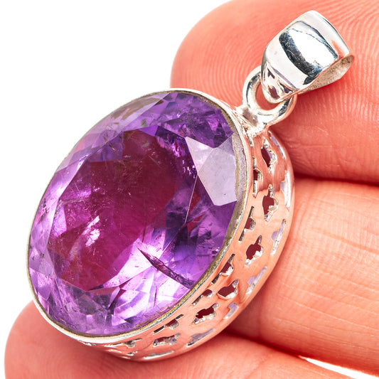 Amethyst pendant with oval faceted purple gemstone and .925 sterling silver setting