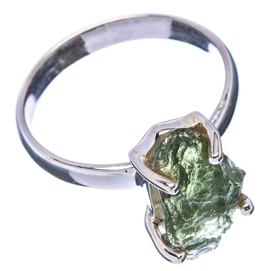 Sterling silver band ring with bezel-set rough green stone and metal corner prongs