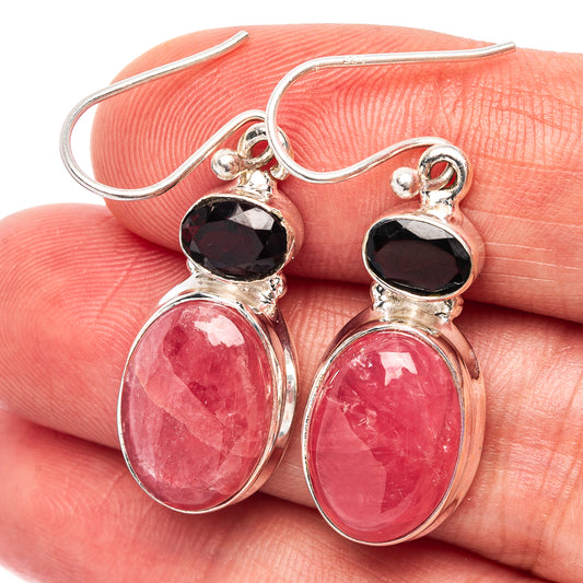 Sterling silver drop earrings with dark red faceted stones and pink oval gems