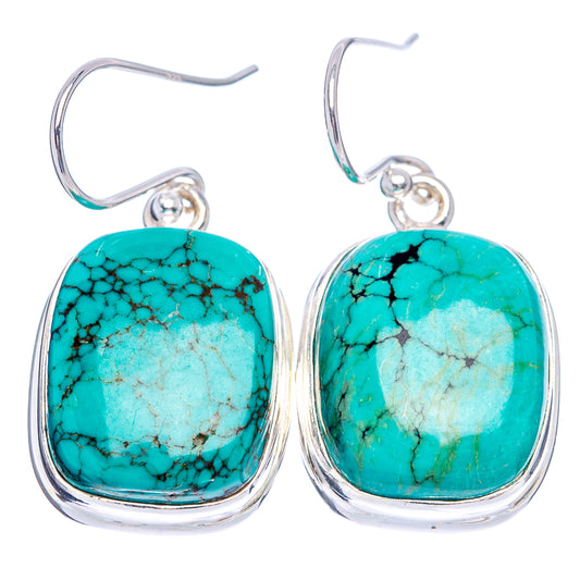 Pair of turquoise oval cabochon drop earrings in .925 sterling silver with hooks