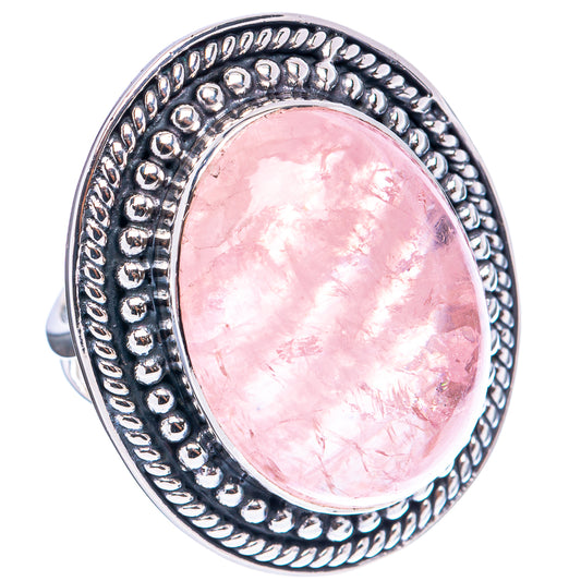 Oval pink morganite cabochon sterling silver ring with ornate oval frame, size 6.