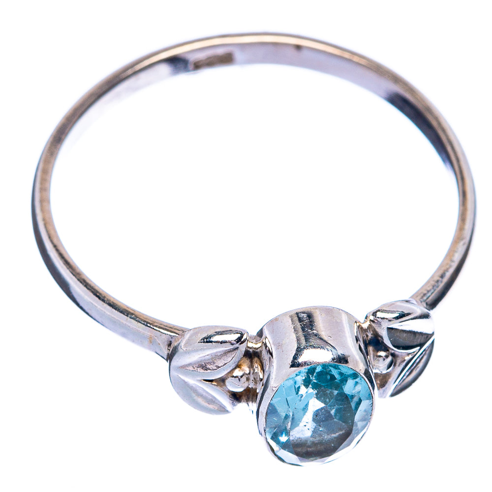 Sterling silver blue topaz ring, oval stone in center with sculpted leaf accents