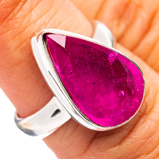 Polished silver teardrop ring with bright magenta pink gemstone bezel