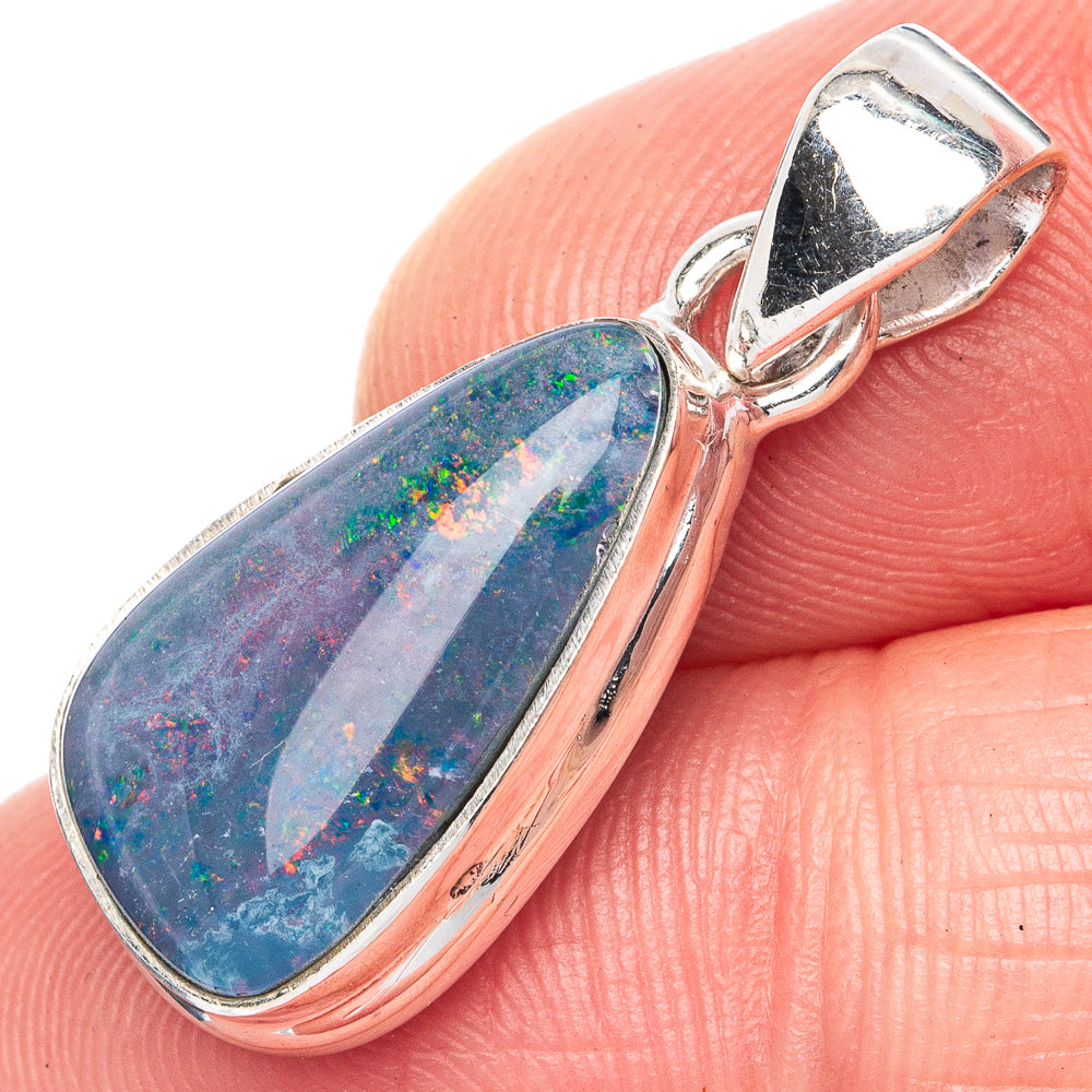 Sterling silver opal triplet pendant with oval blue-green cabochon and loop bail