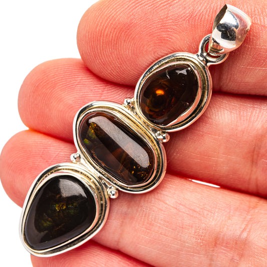 Fire agate pendant in sterling silver, three oval amber-brown stones with orange flashes