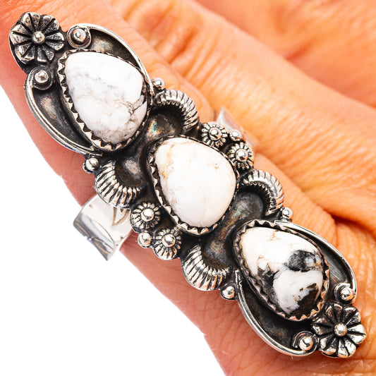 Silver native-style adjustable ring with three oval white buffalo stones, engraved details