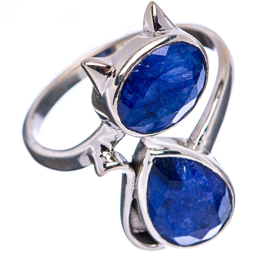 Sterling silver cat ring featuring a large oval blue gemstone and a smaller matching one