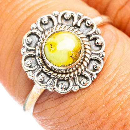 Dainty sterling silver ring with round yellow cabochon and ornate cutout bezel