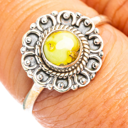 Dainty sterling silver ring with round yellow cabochon and ornate cutout bezel
