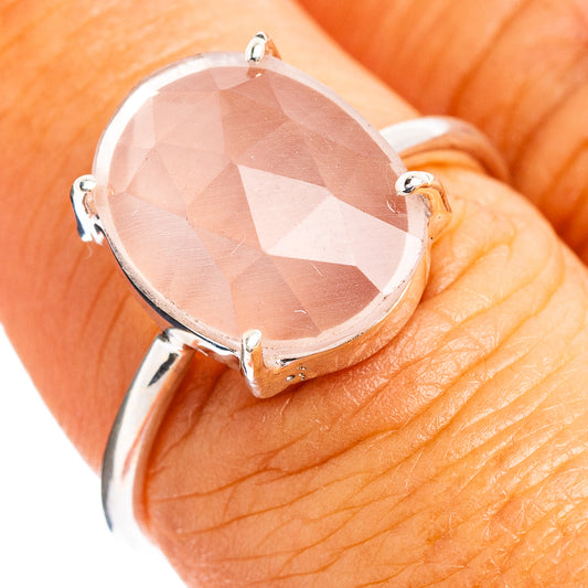 Sterling silver ring with faceted rose quartz oval gemstone, prong-set on band