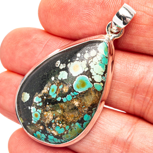 Sterling silver teardrop turquoise pendant with black matrix stone inlay