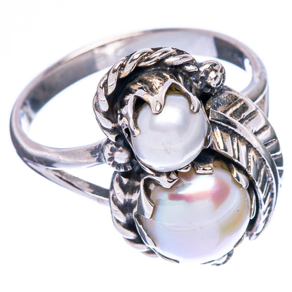 925 sterling silver ring with two white cultured pearls in an ornate swirl setting