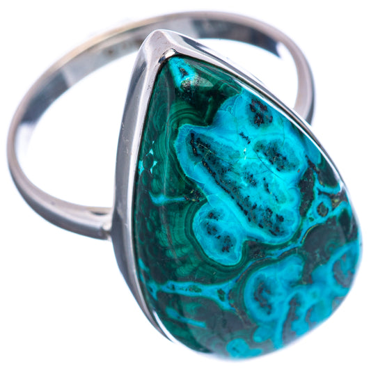 Sterling silver ring set with teal marbled oval cabochon gemstone, black accents