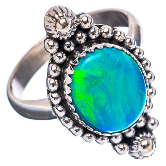 Sterling silver ring with bright blue-green round gemstone in textured beaded border