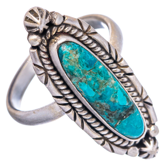 Sterling silver adjustable ring with oval turquoise stone and ropework frame