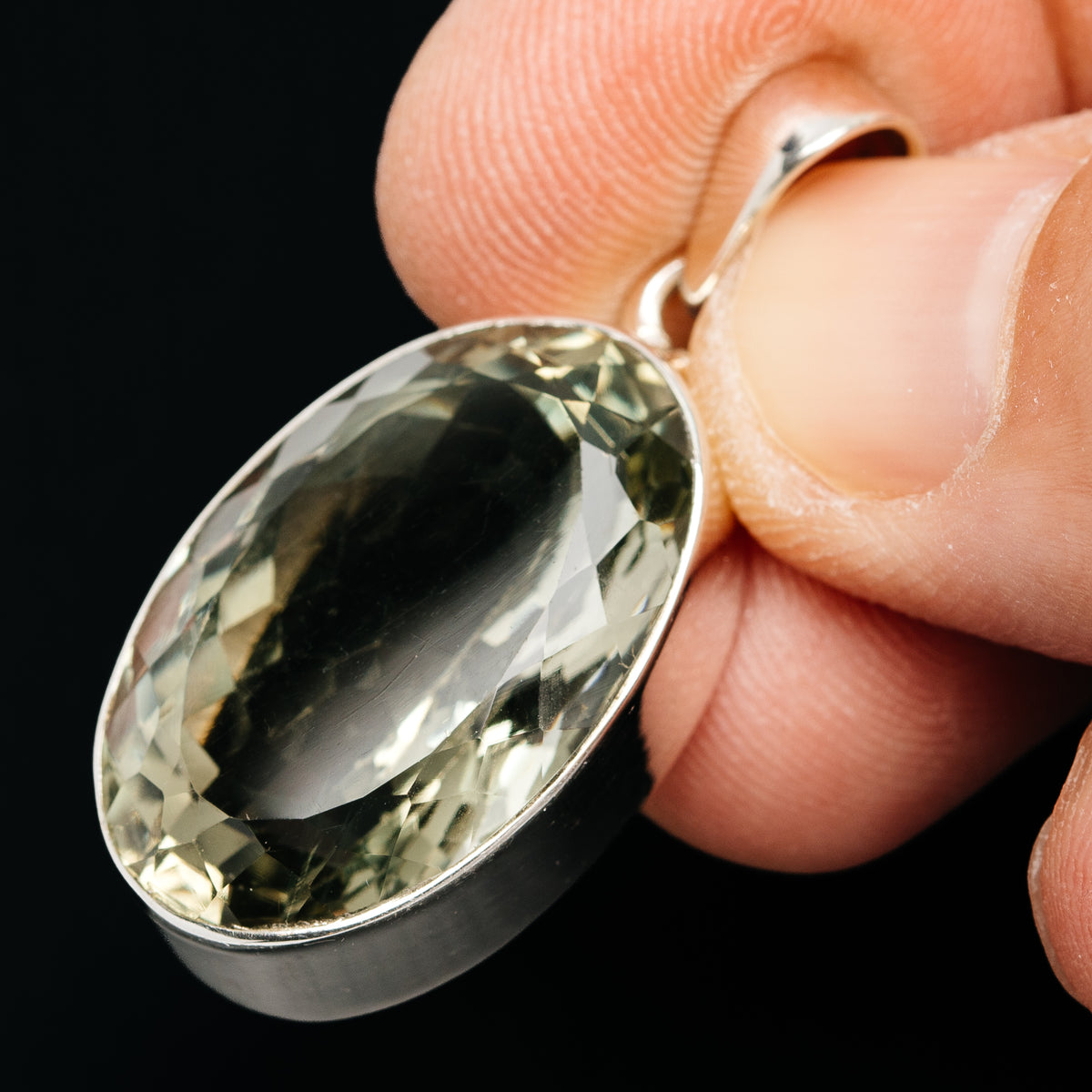 Oval faceted prasiolite pendant bezel detail in .925 sterling silver