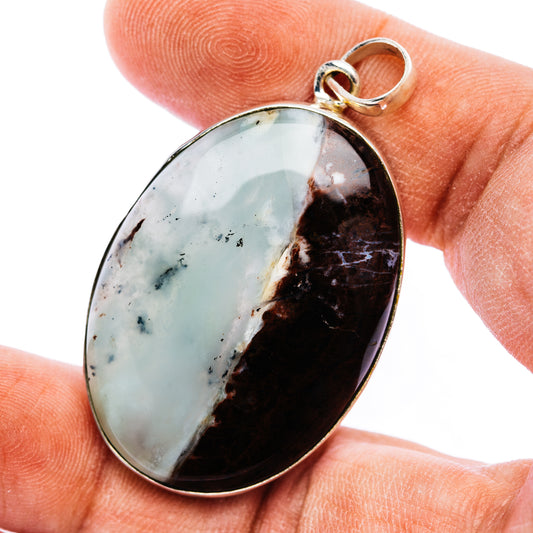 Oval .925 sterling silver pendant with aquaprase-style translucent stone and silver bail