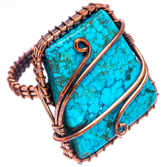 Turquoise gemstone ring with oxidized copper wire wrap, open oval setting