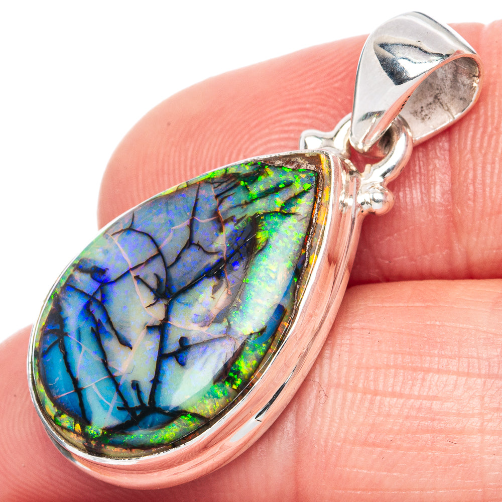 Sterling silver teardrop opal pendant with multicolor iridescent stone and top bail
