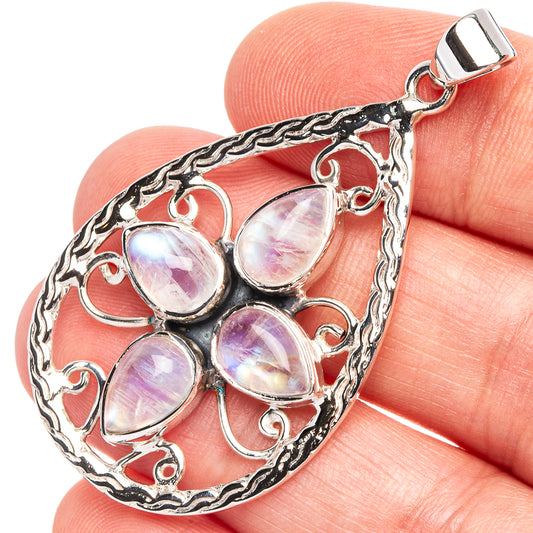 Sterling silver filigree moonstone pendant with five iridescent oval cabochons