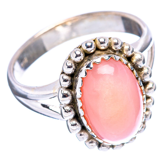 Sterling silver native ring with pink oval opal cabochon and bead details