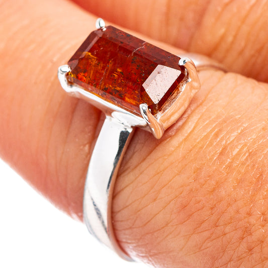 Sterling silver ring with rectangular orange kyanite stone in prong setting