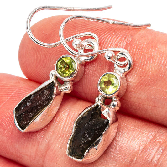 Sterling silver dangle earrings with green round stones and black raw teardrop pieces