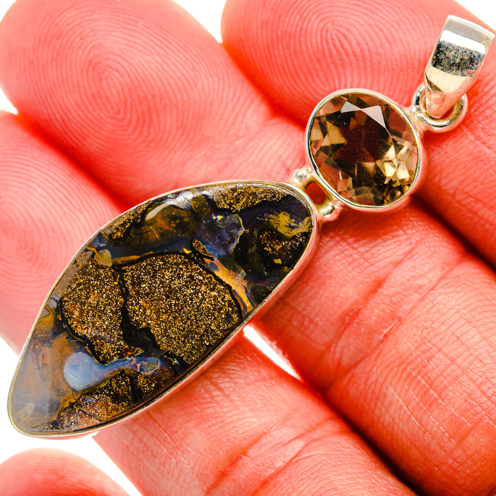 Silver boulder opal and smoky quartz pendant with oval stone and round faceted gem