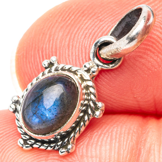 Labradorite pendant with oval blue stone in .925 sterling silver bezel