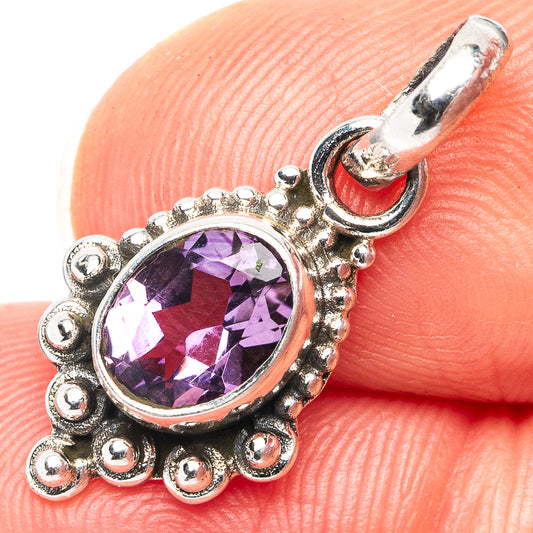 Amethyst pendant charm with oval purple gemstone on .925 sterling silver setting