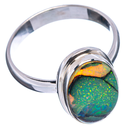 Sterling silver opal ring with oval dark green and orange iridescent gemstone, band visible