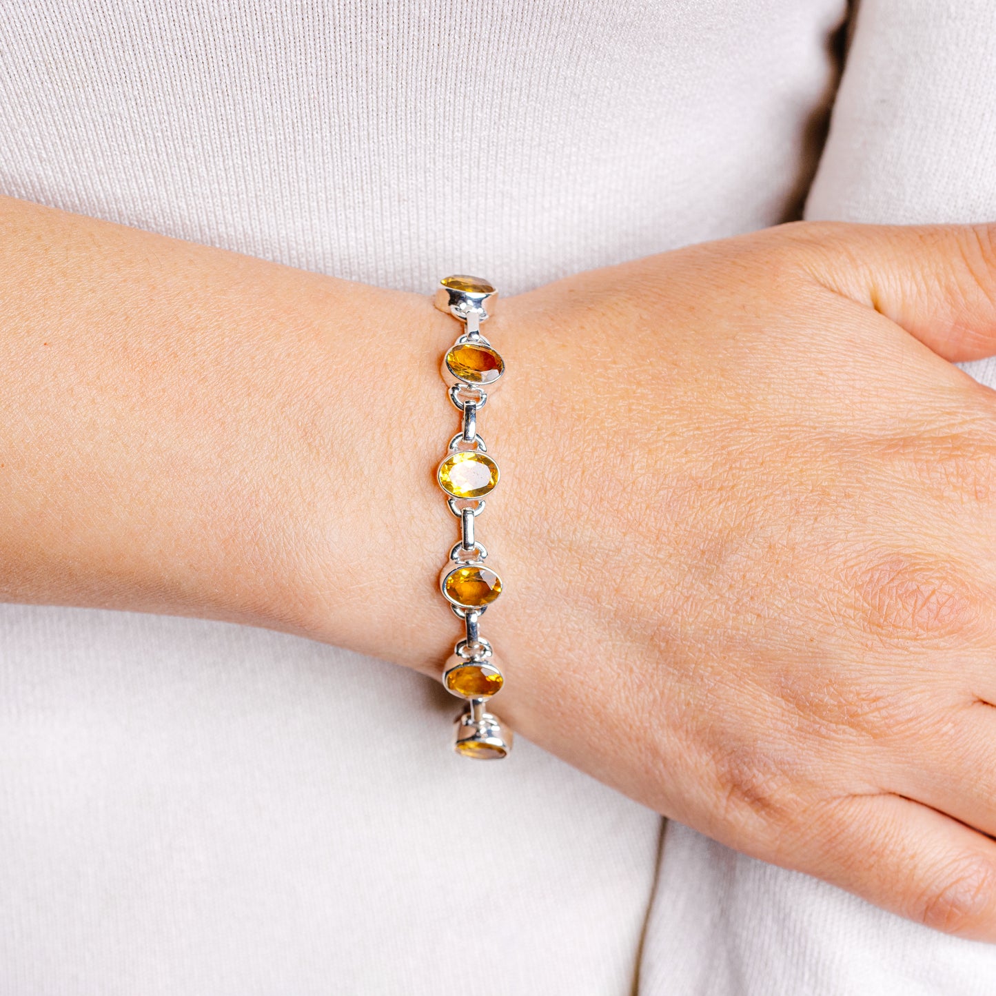 Citrine gemstone bracelet in .925 sterling silver with linked yellow-gold stones