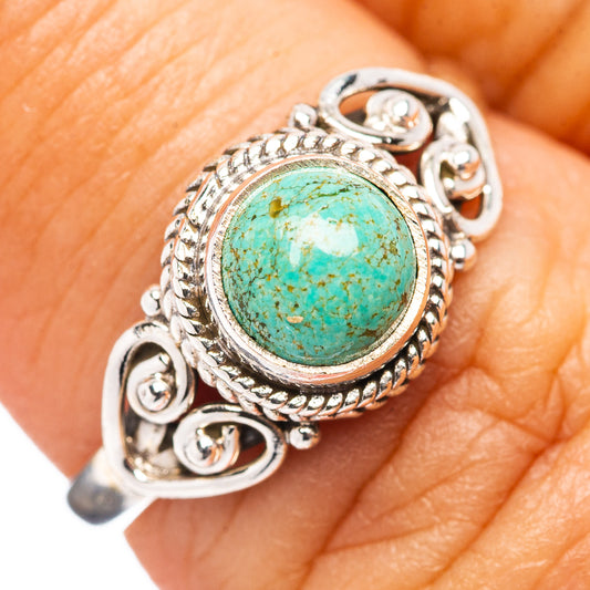 Sterling silver turquoise ring with oval Mojave stone and ornate swirls, size 6.5