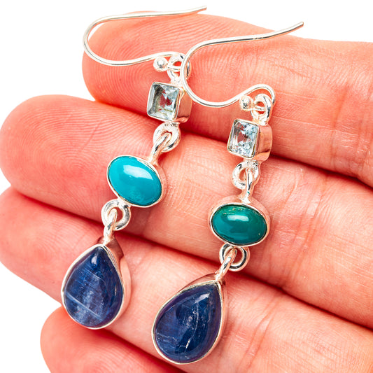 Sterling silver dangle earrings with turquoise oval, blue teardrop, and light blue squares