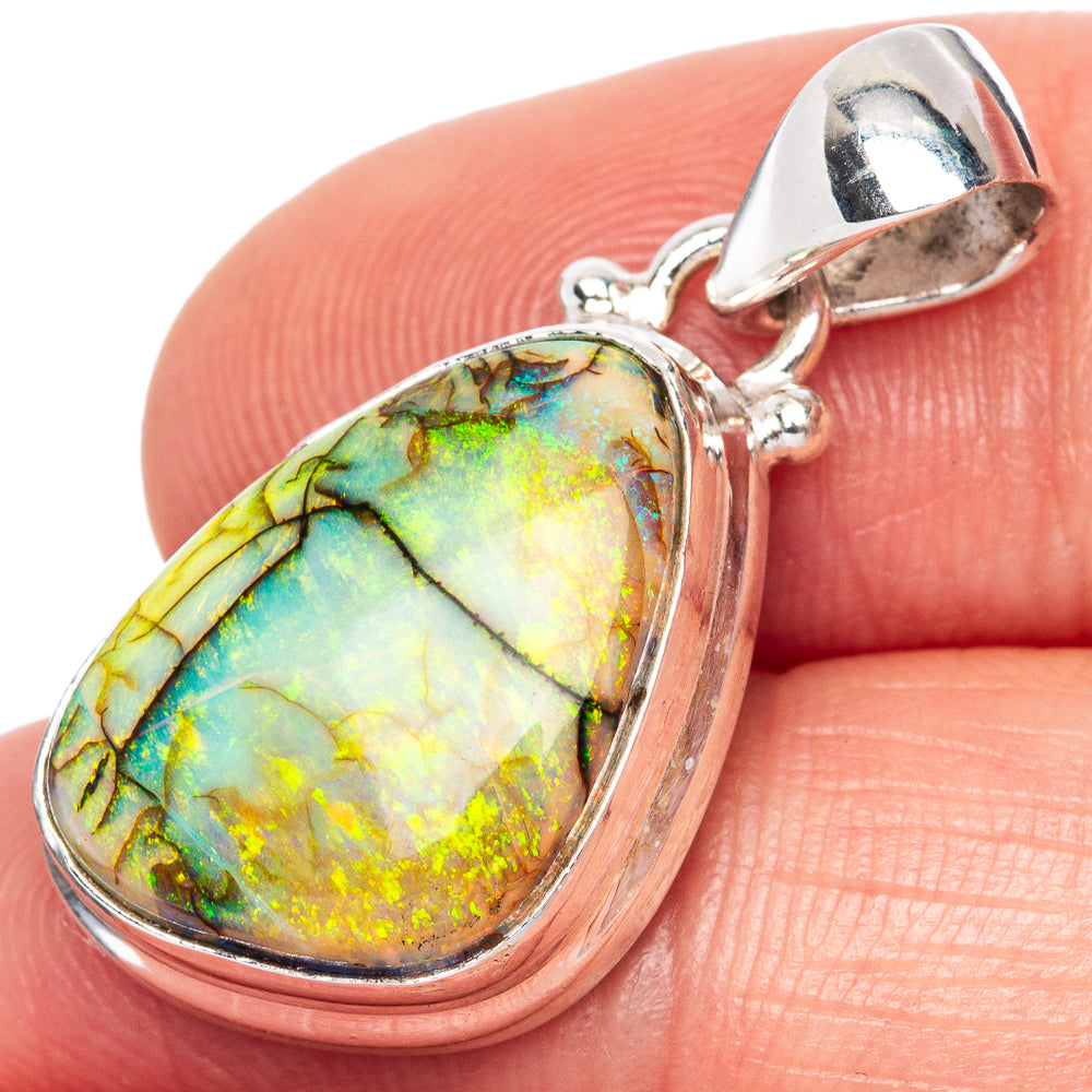 Oval opal pendant in sterling silver with rainbow green, blue, and gold shimmer