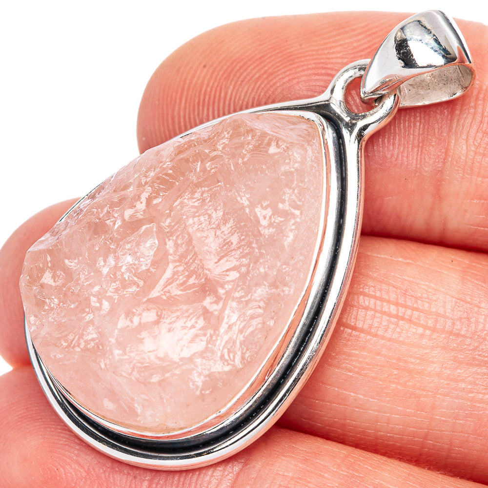 Rose quartz pear pendant with silver border and top bail in 925 sterling silver.