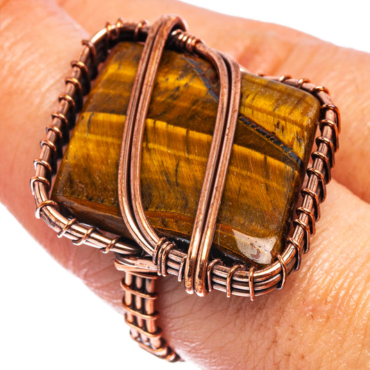 Oxidized copper wire wrap ring with rectangular tiger's eye gemstone, open top loop