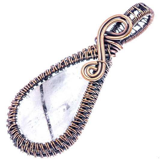 Oxidized copper wire-wrap pendant with pale teardrop quartz and spiral wire frame