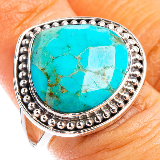 Turquoise cabochon sterling silver ring with bead edge detail