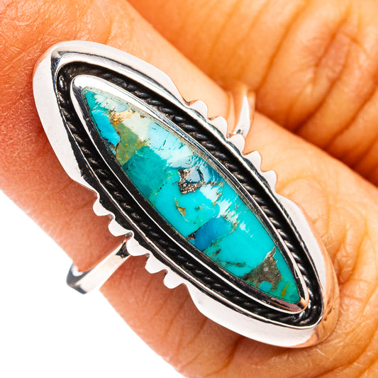 Native Style Mohave turquoise ring with oval inlay and silver scalloped bezel