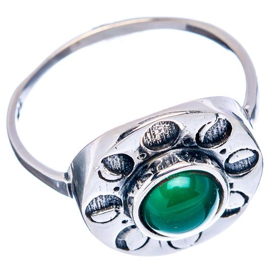 Sterling silver ring with green oval onyx set in an engraved band