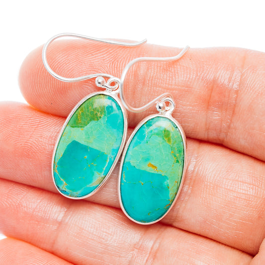 Turquoise oval drop earrings in .925 sterling silver with scalloped bezel and fishhook backs