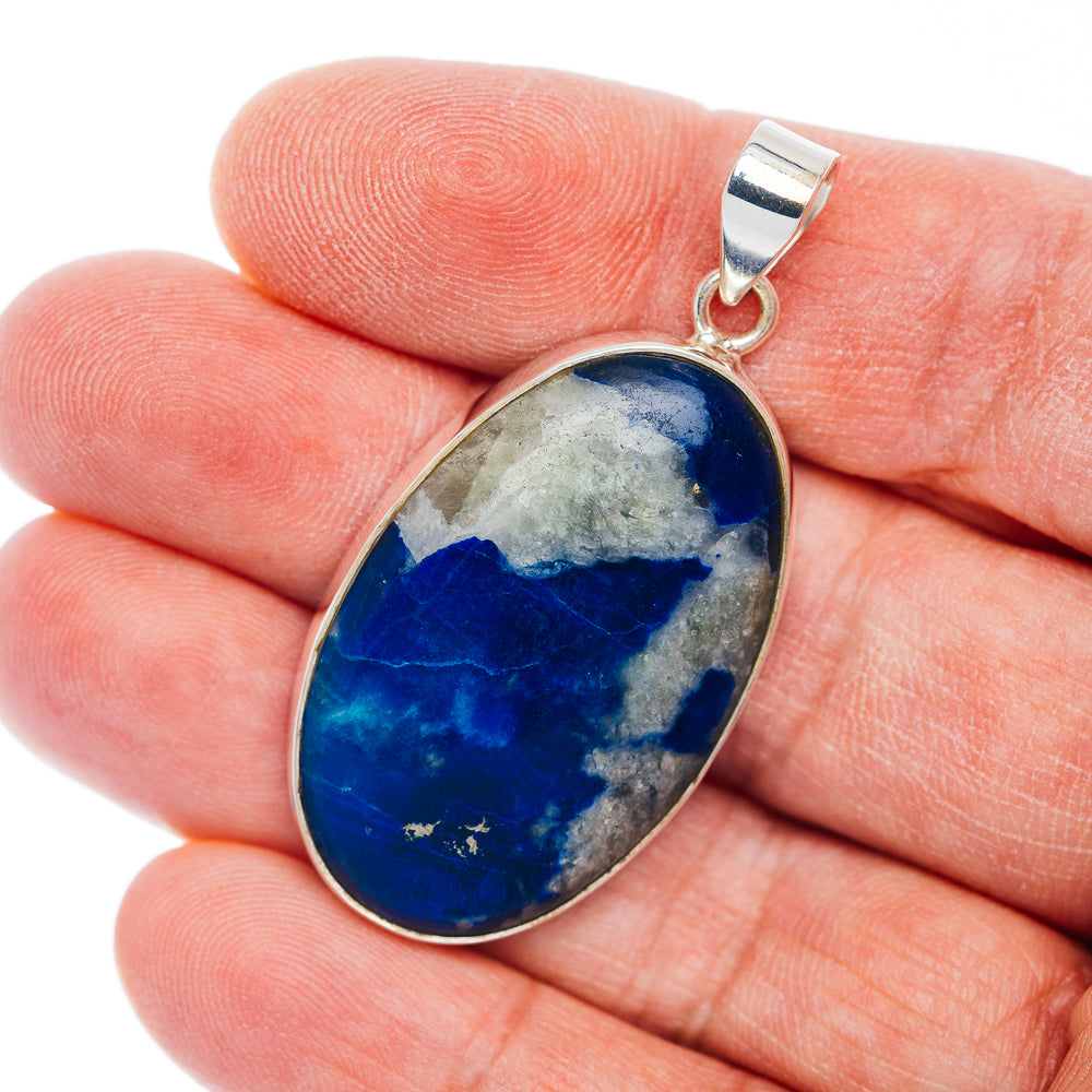 Oval Afghanite pendant in .925 sterling silver, blue gemstone bezel setting